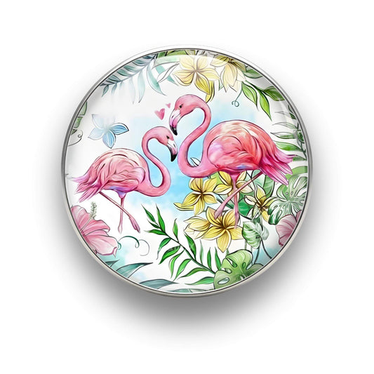 Nahaufnahme des 18mm Tropical Flamingo Glas Motiv-KLIQs "Bunte Blumenwiese". Der Druckknopf symbolisiert Optimismus und gute Laune.